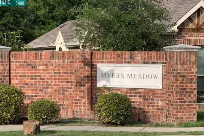 myers meadow sign sidewalk